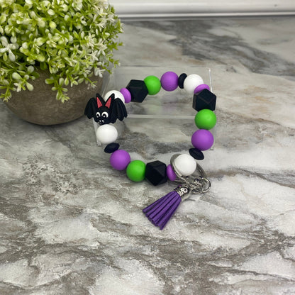 Silicone Bracelet Keychain - Green + Purple Bat
